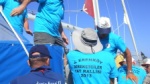Yacht Rally members disembarking into rubber dinghy